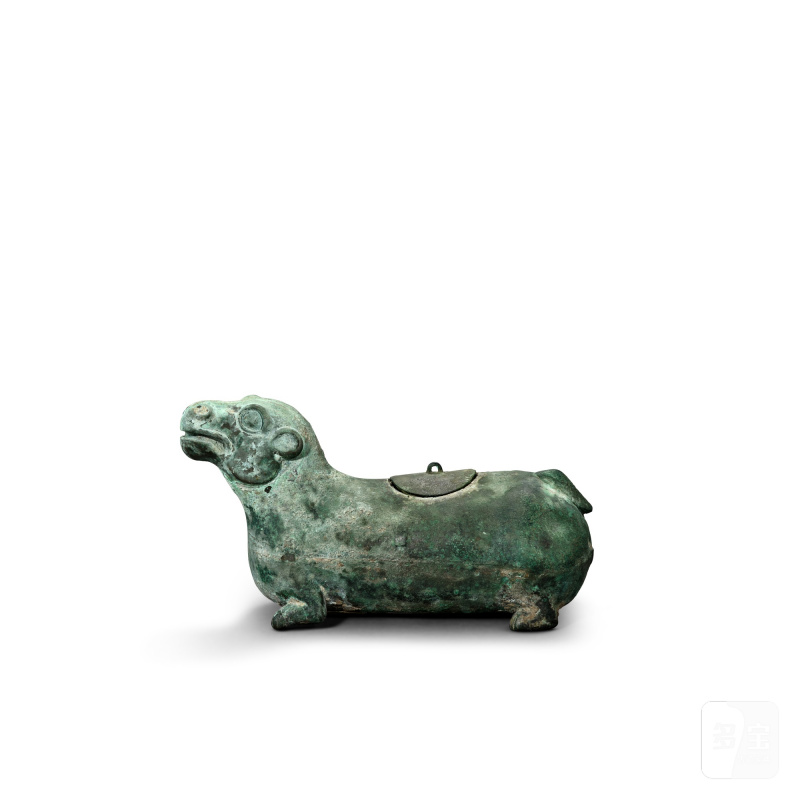 An archaic bronze 'tapir' wine vessel and cover, zun, Han dynasty | 漢 青銅連蓋貘尊